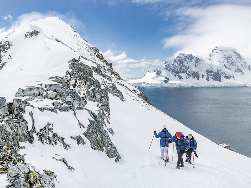 People snowshoeing in Orne Harbour in Antarctica