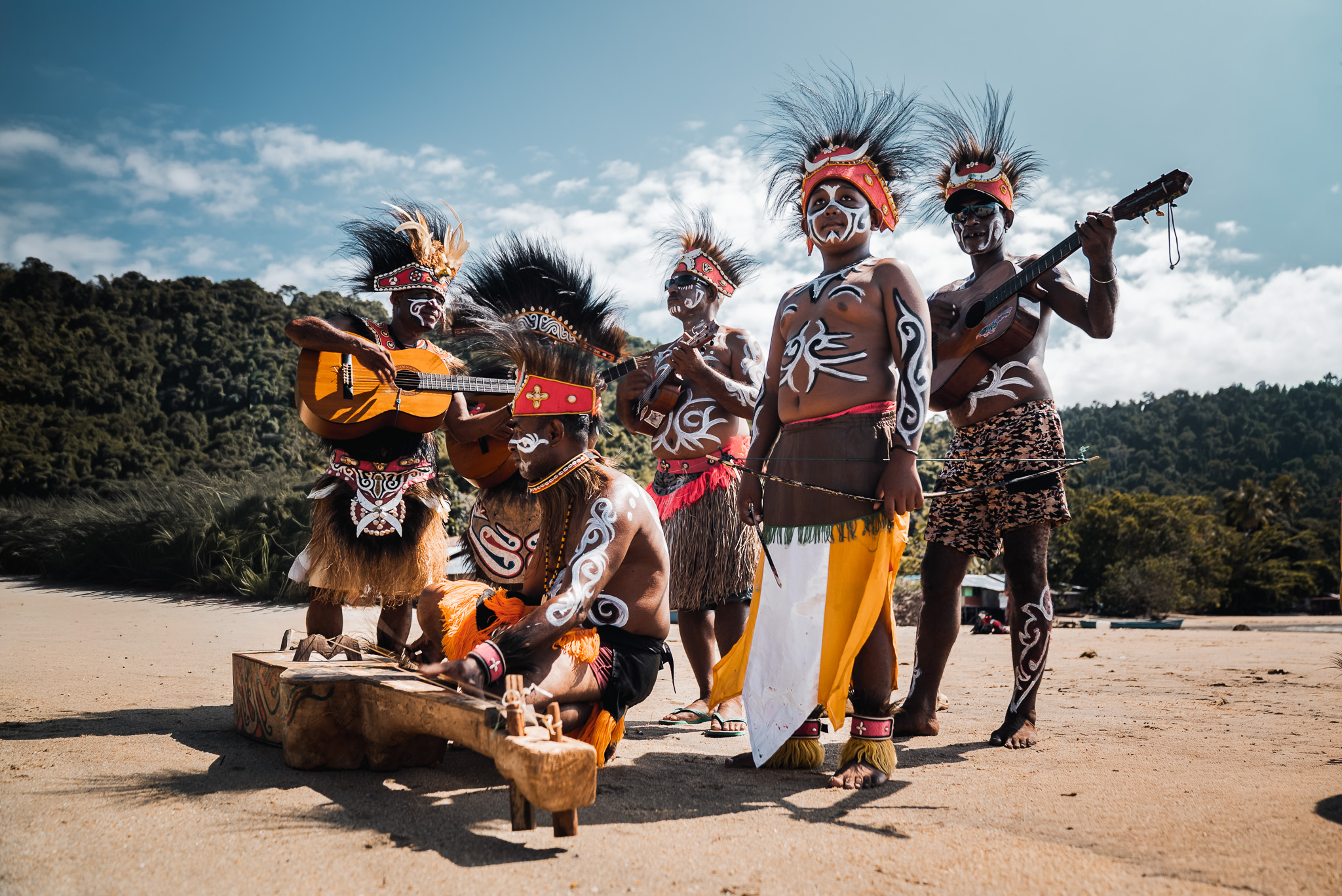 People in traditional dress playing instruments