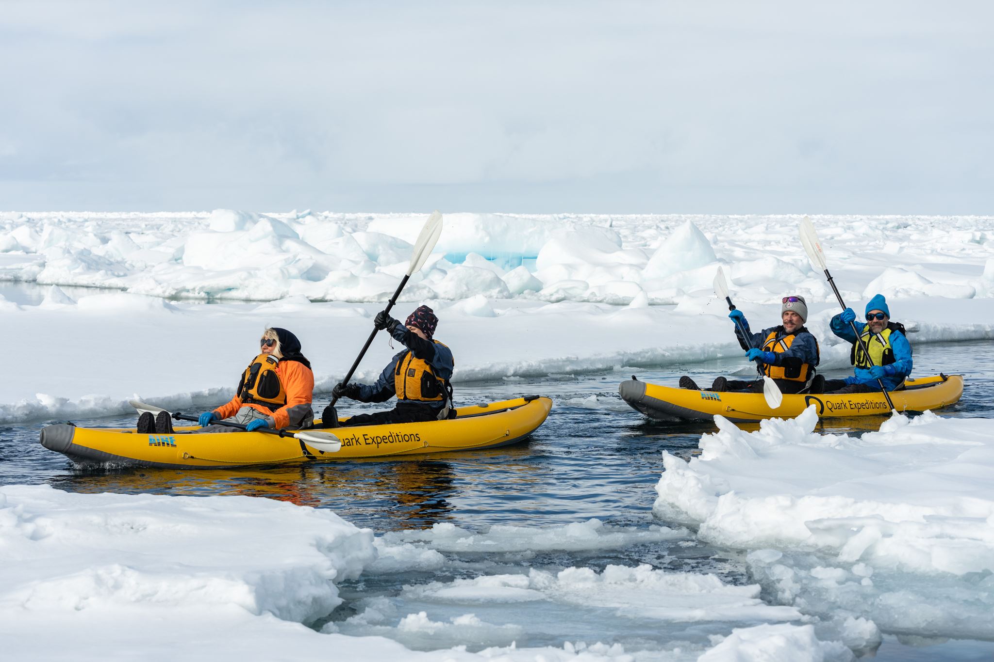 Kayakers in Svalbard ice