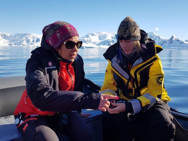 Dr Verena onboard a zodiac with guest
