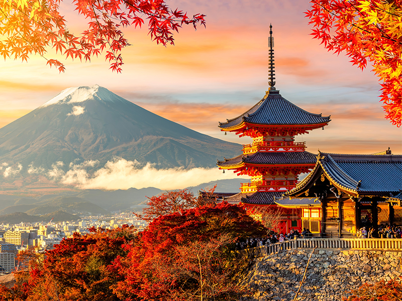 Kiyomizu-dera temple in Kyoto and mount Fuji at autumn sunset, Japan