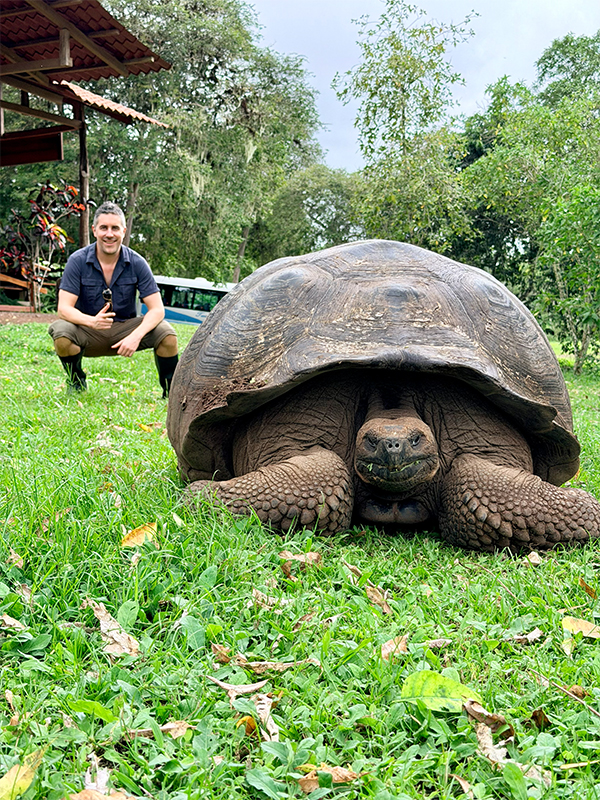 Lewis meets a classic giant tortoise in the highlands at El Manzanillo Ranch