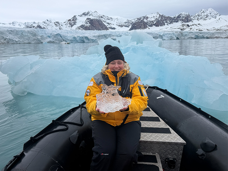 Michelle enjoying the ice inside and outside the zodiac