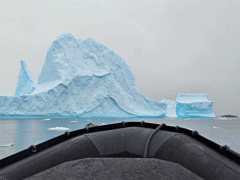 Kasey capturing ice floes from the zodiac in Antarctica